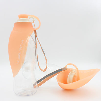 FurMates Co HydroFlip dog travel water bottle in orange with leak-proof flip bowl and carry strap