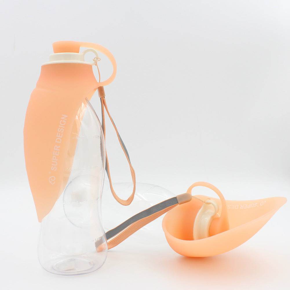 FurMates Co HydroFlip dog travel water bottle in orange with leak-proof flip bowl and carry strap